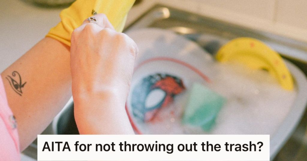 Woman washing dirty dishes in the sink