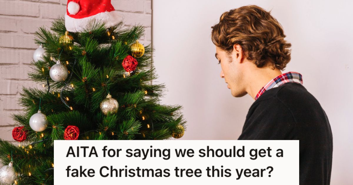Man setting up a Christmas tree