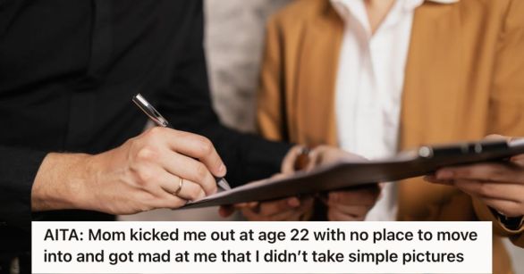 Man signing a document with another person beside him
