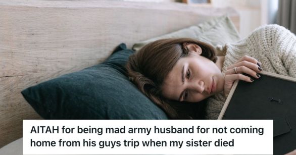 Grieving woman hugging a photo frame while lying down on the bed