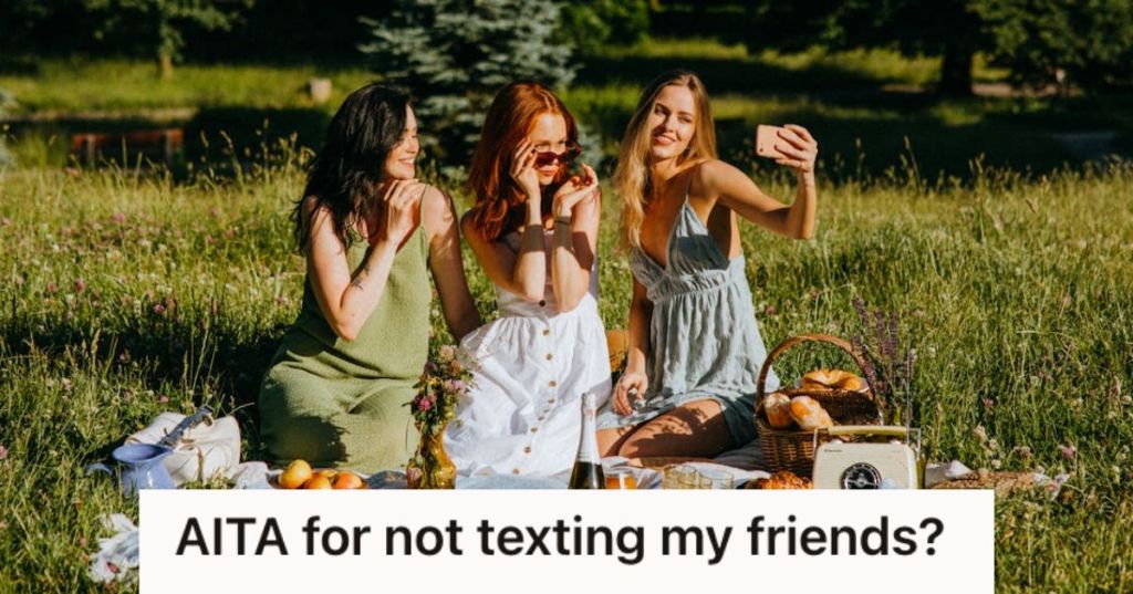 Girl friends having a picnic and taking selfies together