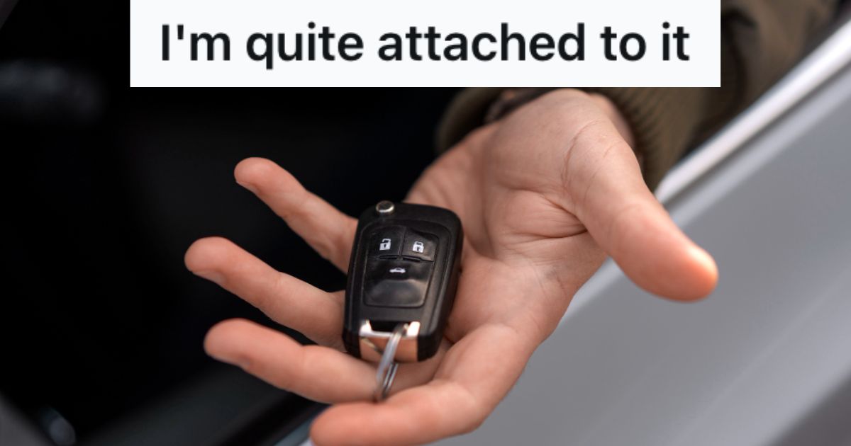 Man holding a car key fob
