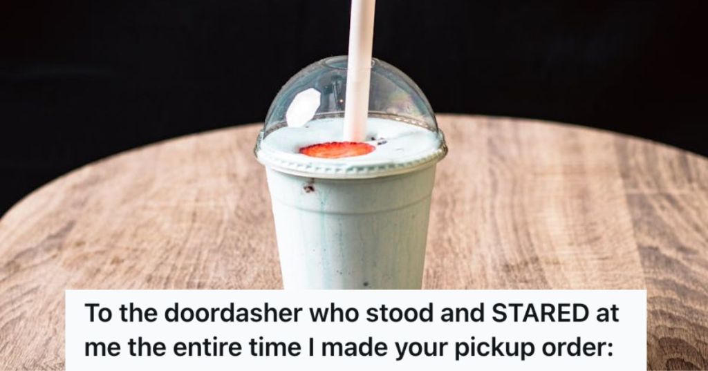 Delicious smoothie in a to go cup wih straw