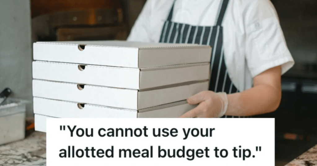 Employee handing several boxes of pizza