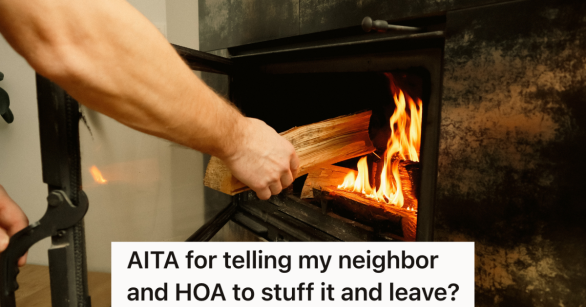 man putting wood in fireplace