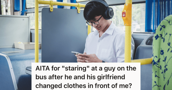 man sitting on bus wearing headphones and looking at phone