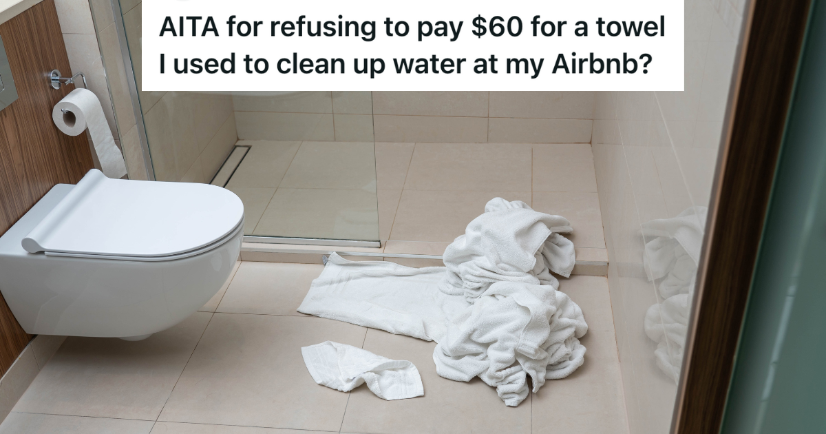 pile of used white towels on bathroom floor
