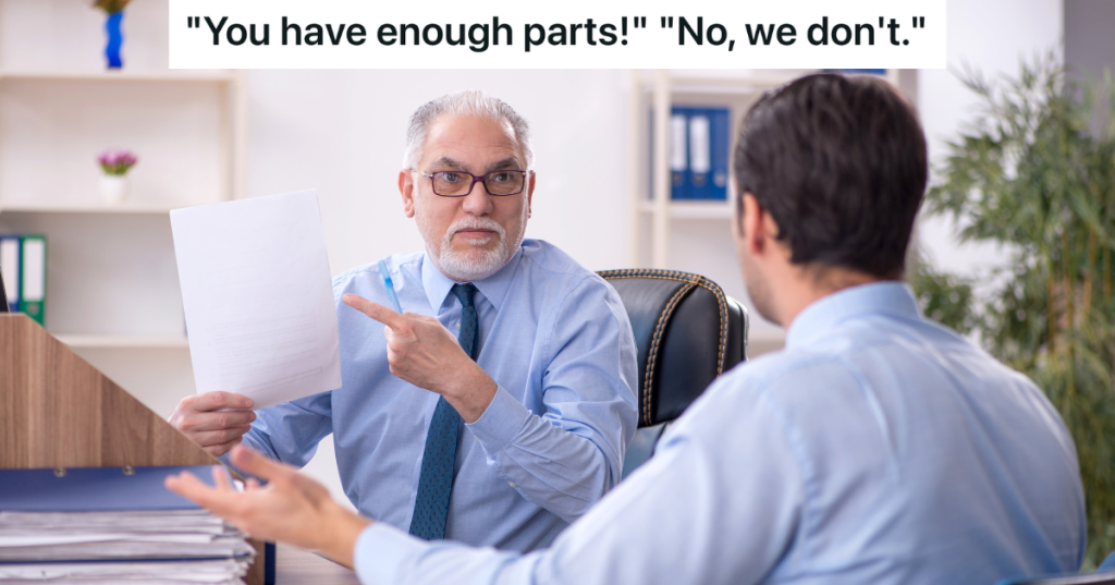 two male employees arguing