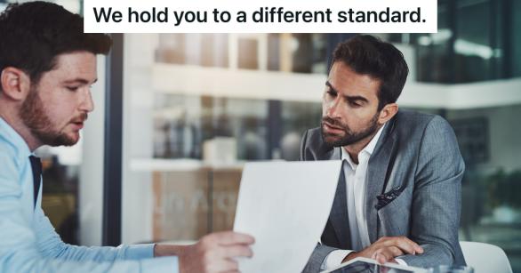 two businessmen looking at a piece of paper