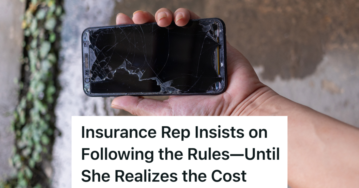 man holding phone with cracked screen