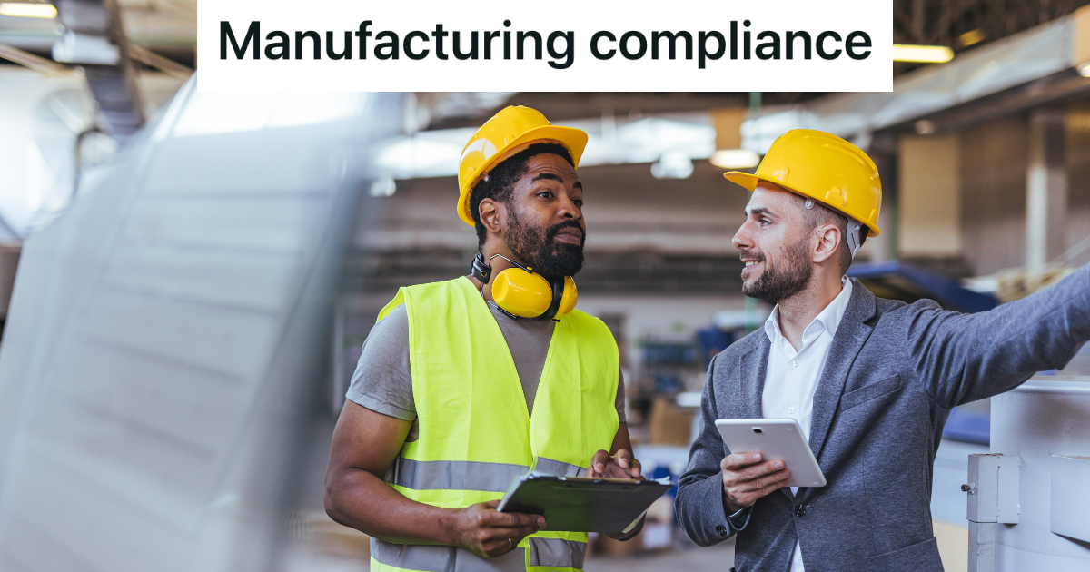 factory worker talking to supervisor