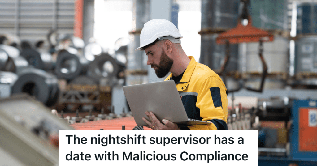 man in hardhat looking at assembly line machine