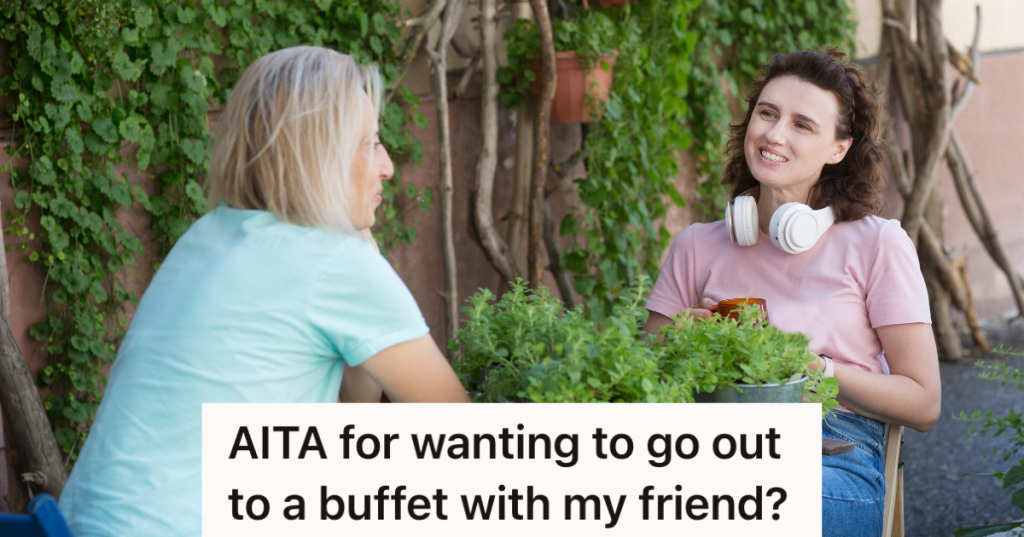 two women sitting outside talking