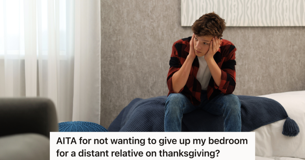 upset teenage boy sitting on bed