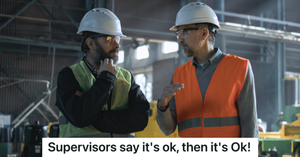 two men in hardhats having a conversation