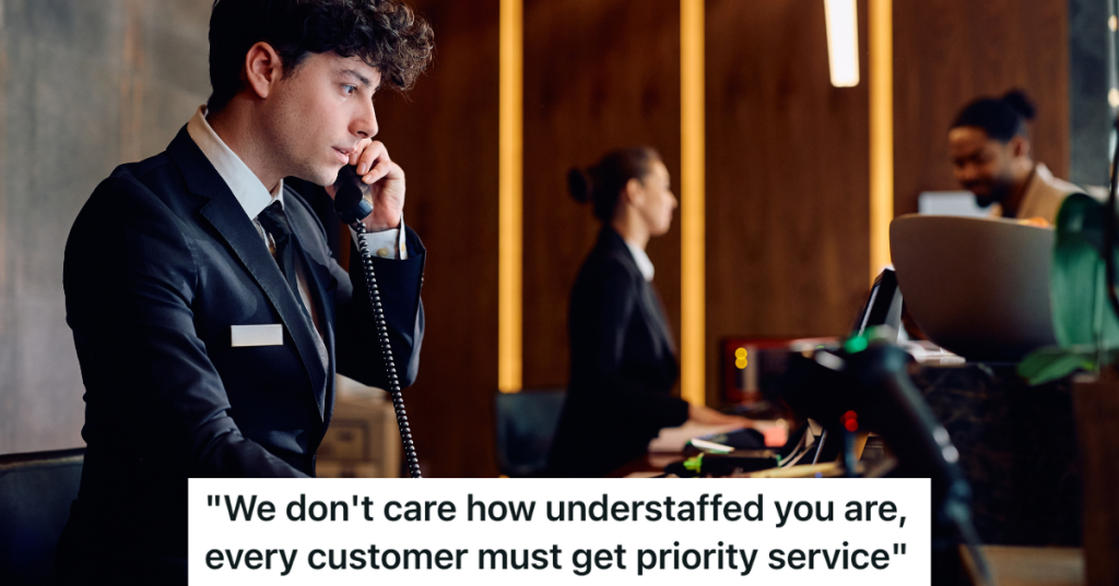 man on the phone at hotel reception desk