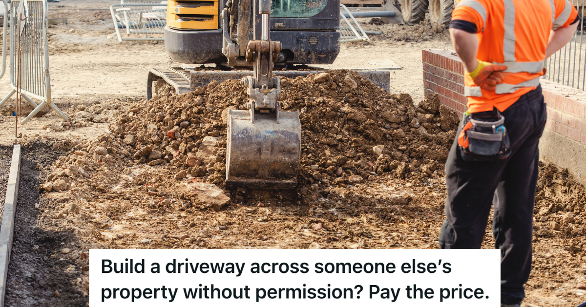 Excavator digging the ground for new driveway