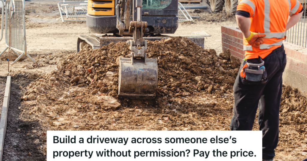 Excavator digging the ground for new driveway