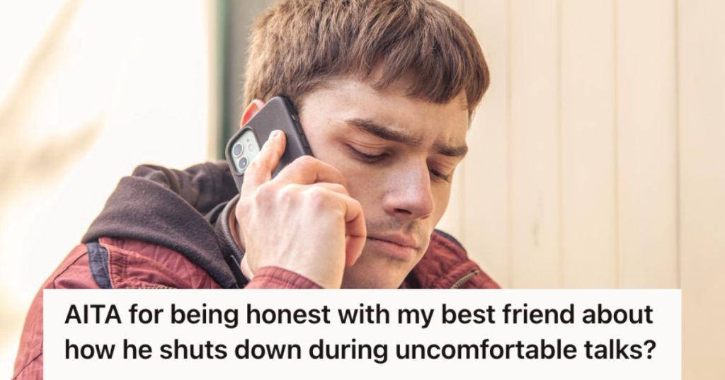 Sad young man talking on the phone