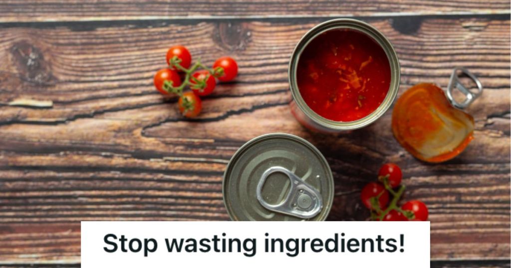Open and closed cans of tomato sauce with some cherry tomatoes on the side