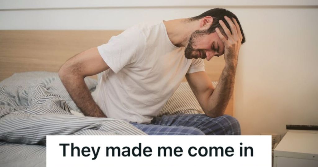 Man in pajamas not feeling well and holding his head