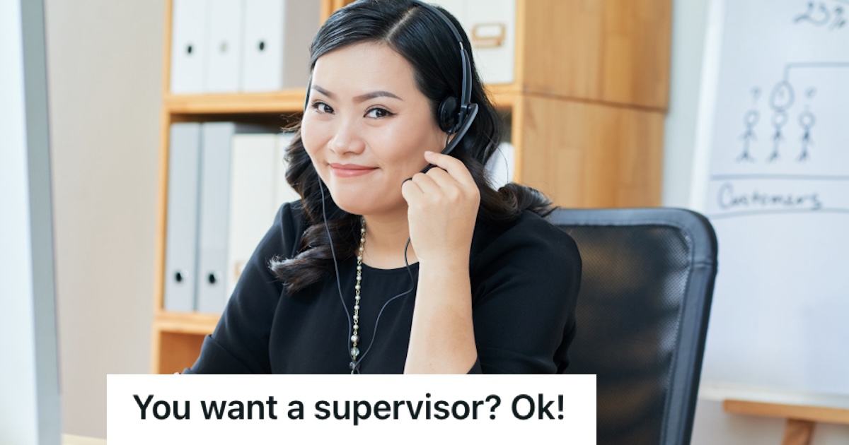 Woman taking a call using her headset in the office