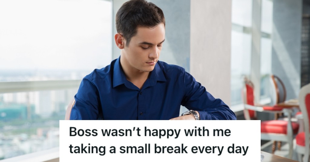 Office employee looking at his watch