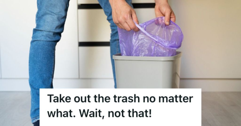 Man pulling up the trash bag from the trash bin