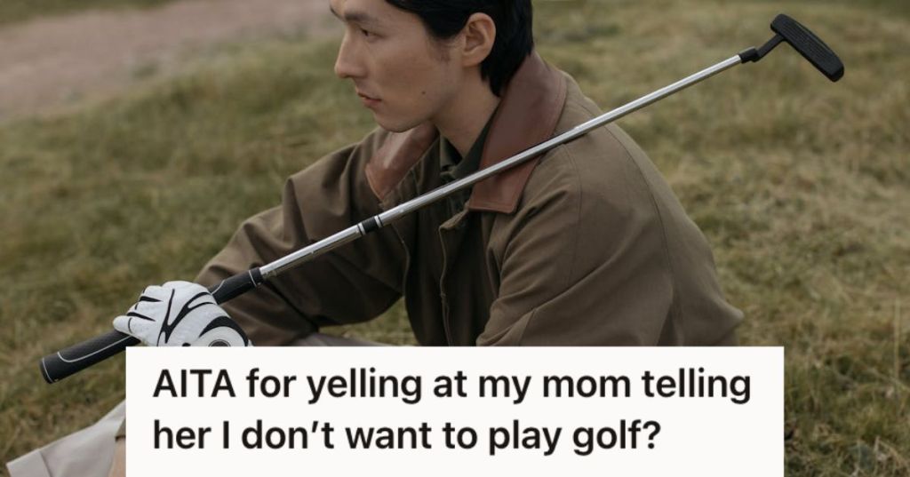 Young man sitting on the grass and holding a gold club