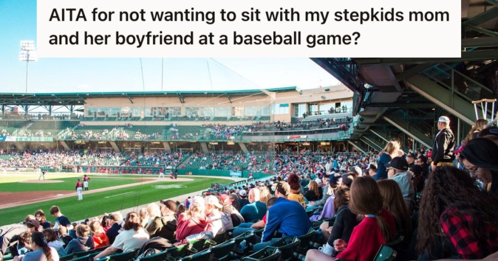 People are watching a baseball game from their seats