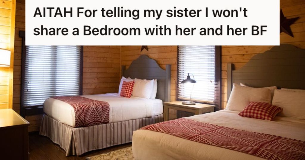 A clean bedroom with two beds