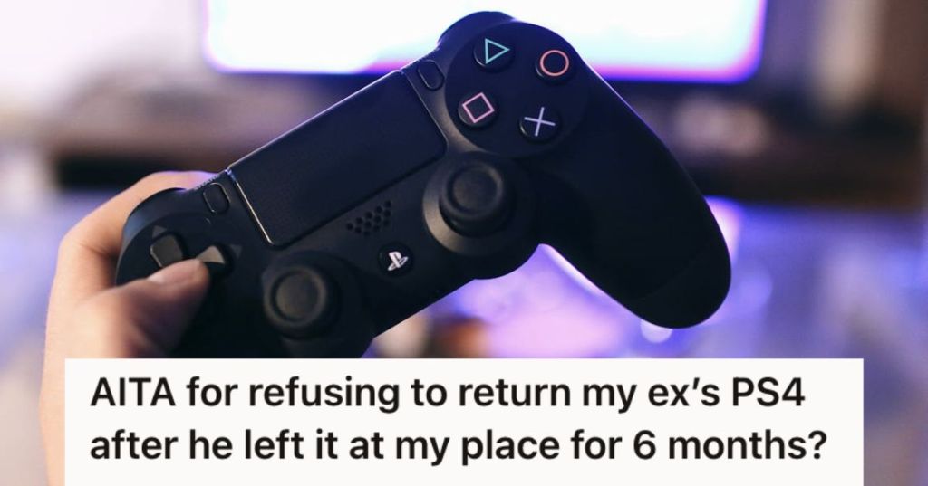 Person holding a PlayStation controller