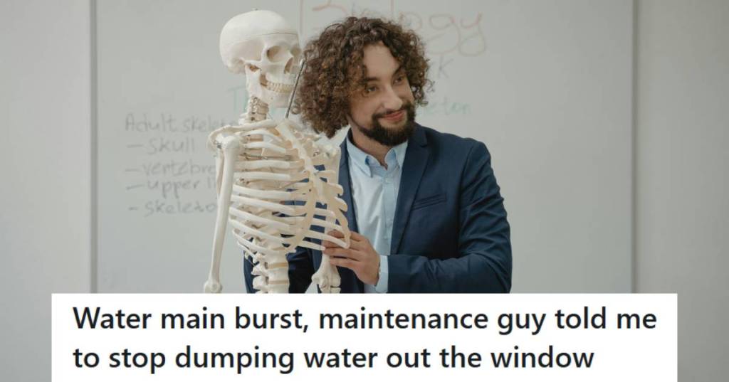 Science Teacher holding a skeleton as he teaches class