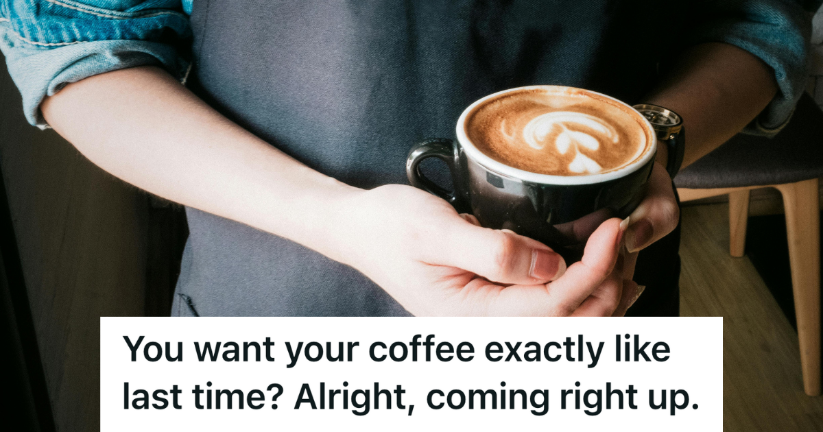 barista holding a mug of coffee