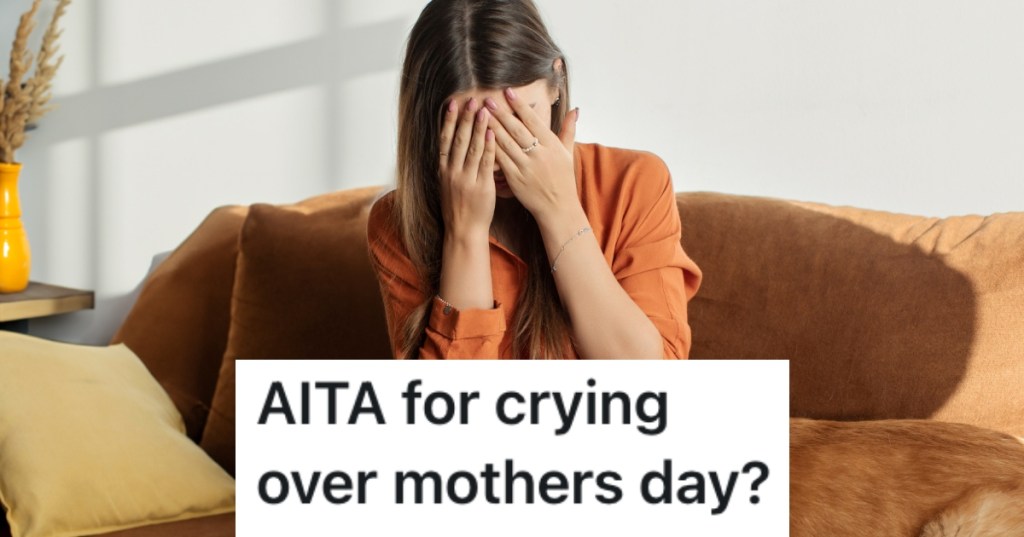 woman crying on a couch