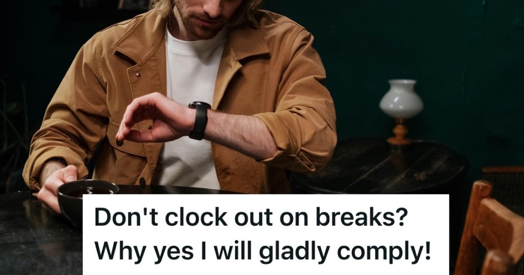 Man having coffee looking at his watch