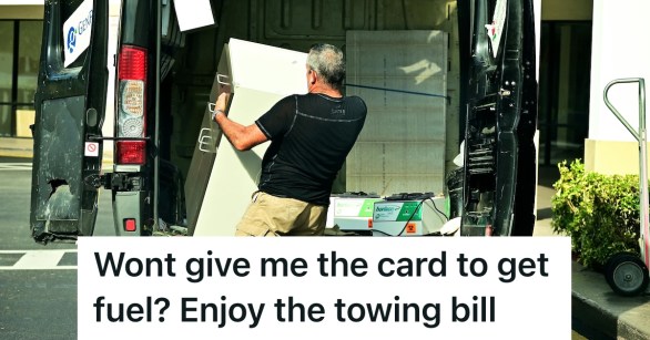 Man delivering furniture from the back of a vehicle