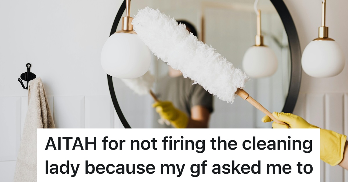 person dusting the mirror