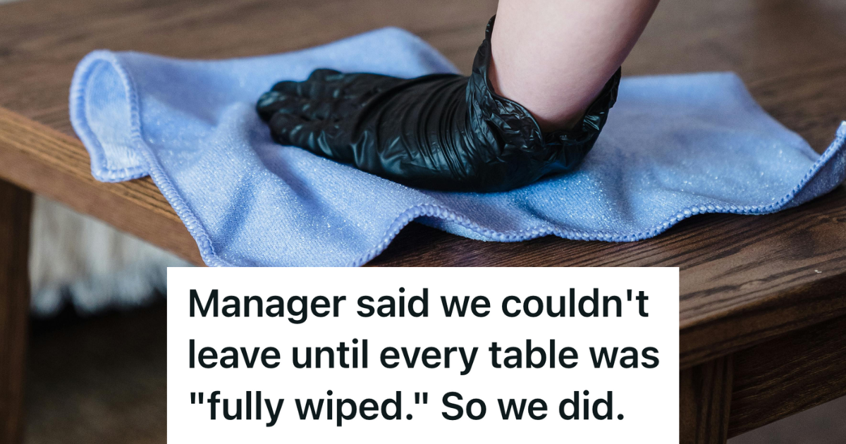 employee wiping down table with rag