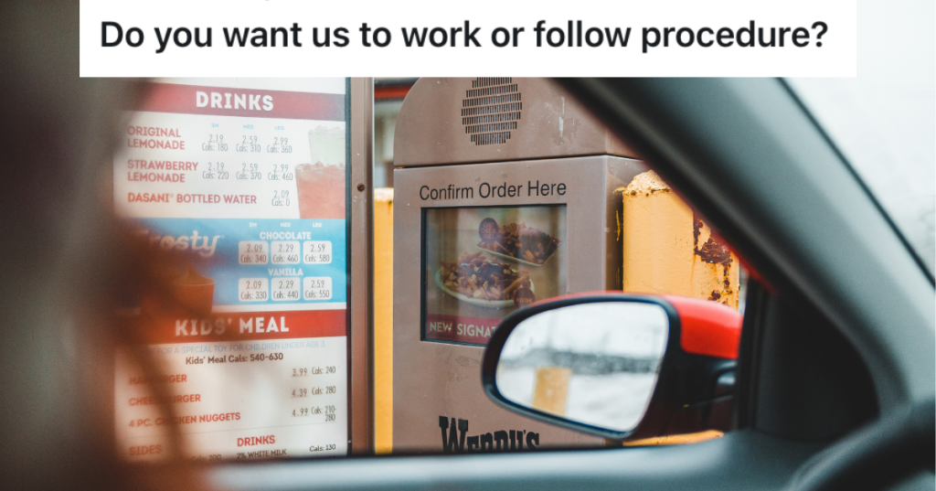 view from inside a car looking at a fast food drive through menu.