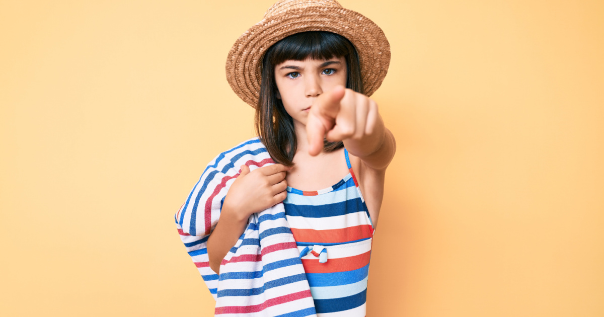 angry girl holding a towel