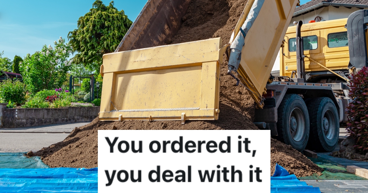 truck delivering a load of soil