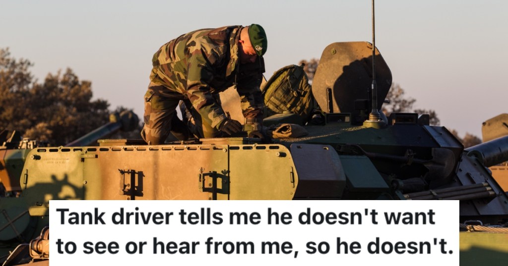 man on top of a tank