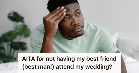 man in green shirt looking stressed