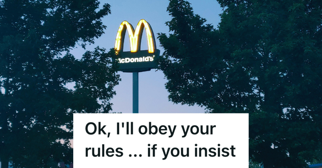 mcdonalds arches sign visible through trees at night