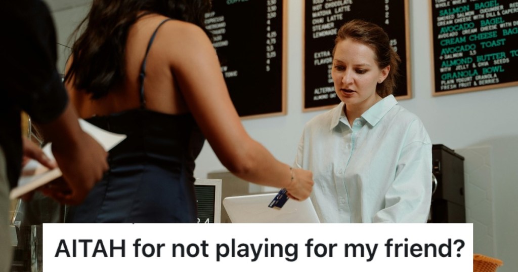 woman paying for a coffee