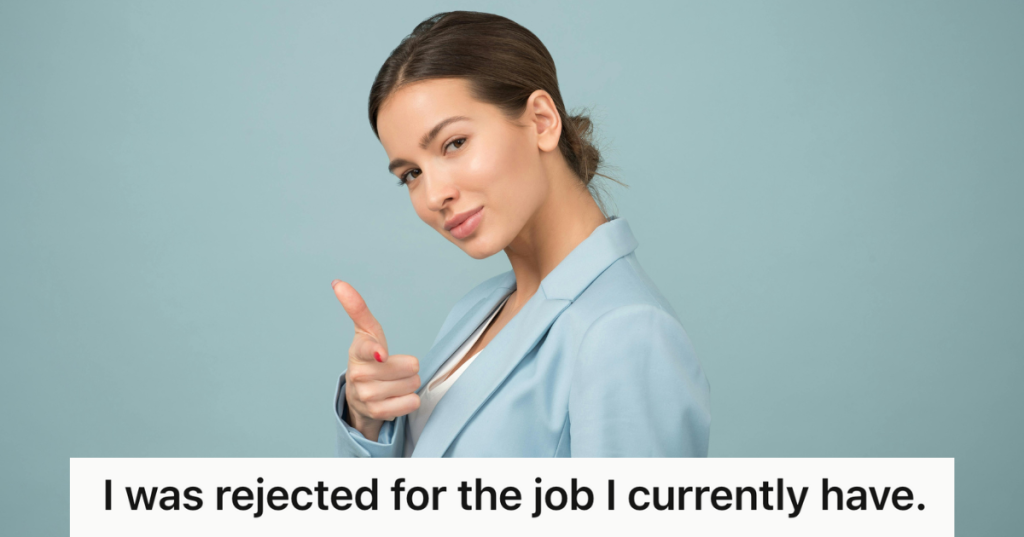 professional woman smugly pointing at the camera