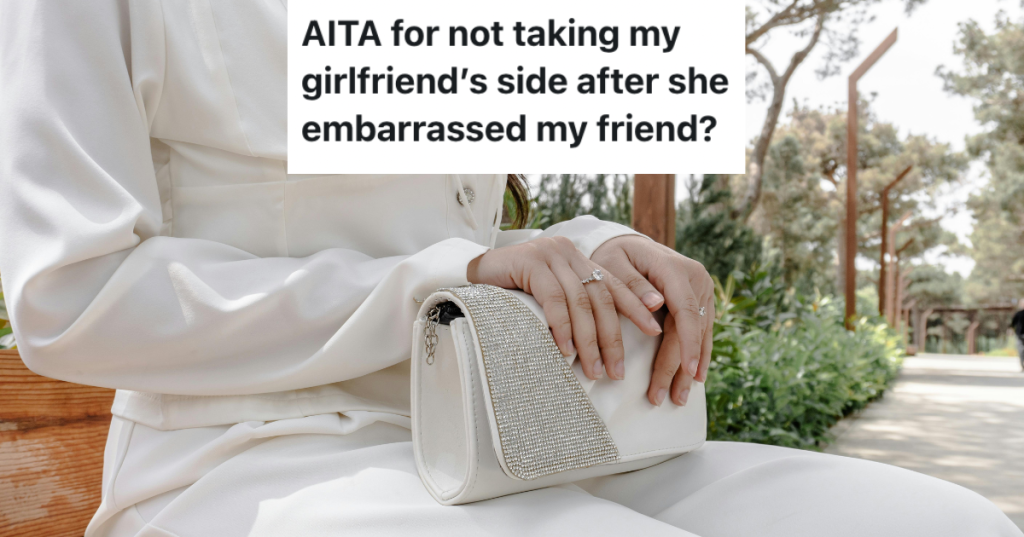 Woman sitting wearing white and holding a purse.