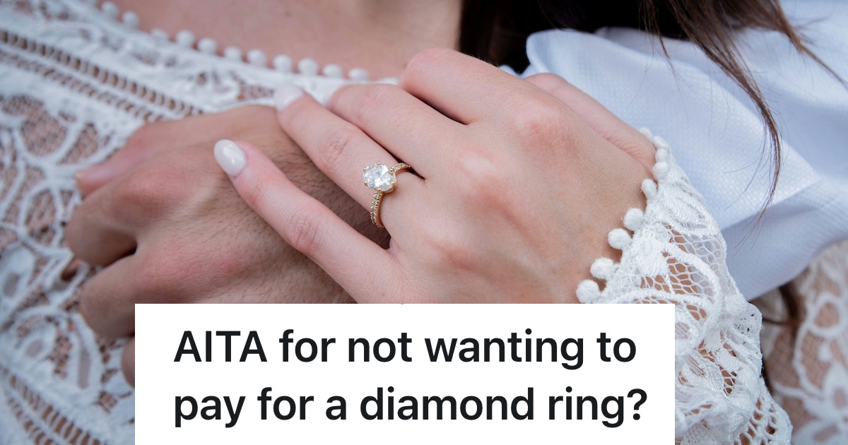closeup of woman's hand with diamond engagement ring