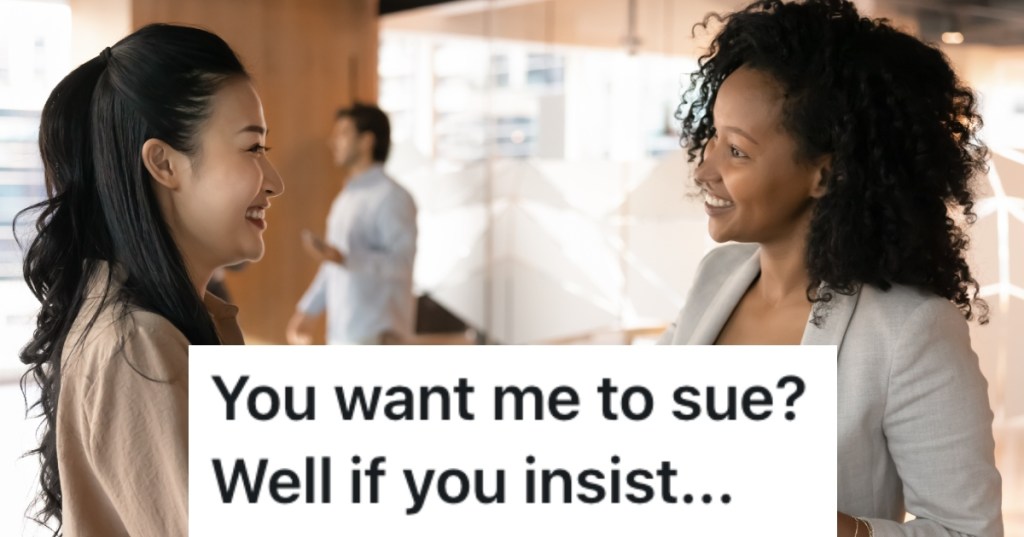 two women shaking hands